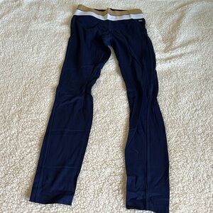 EUC Pink Active Navy tights with gold and white striped waistband